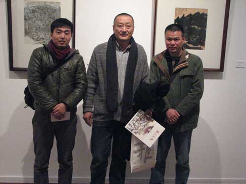 林少云端经理、画家李建国、陈迹老师合影