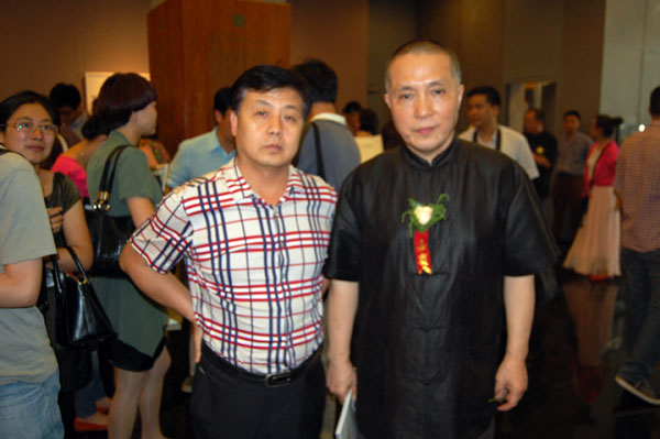 著名画家周京新与总编杨杏盛娱乐合影